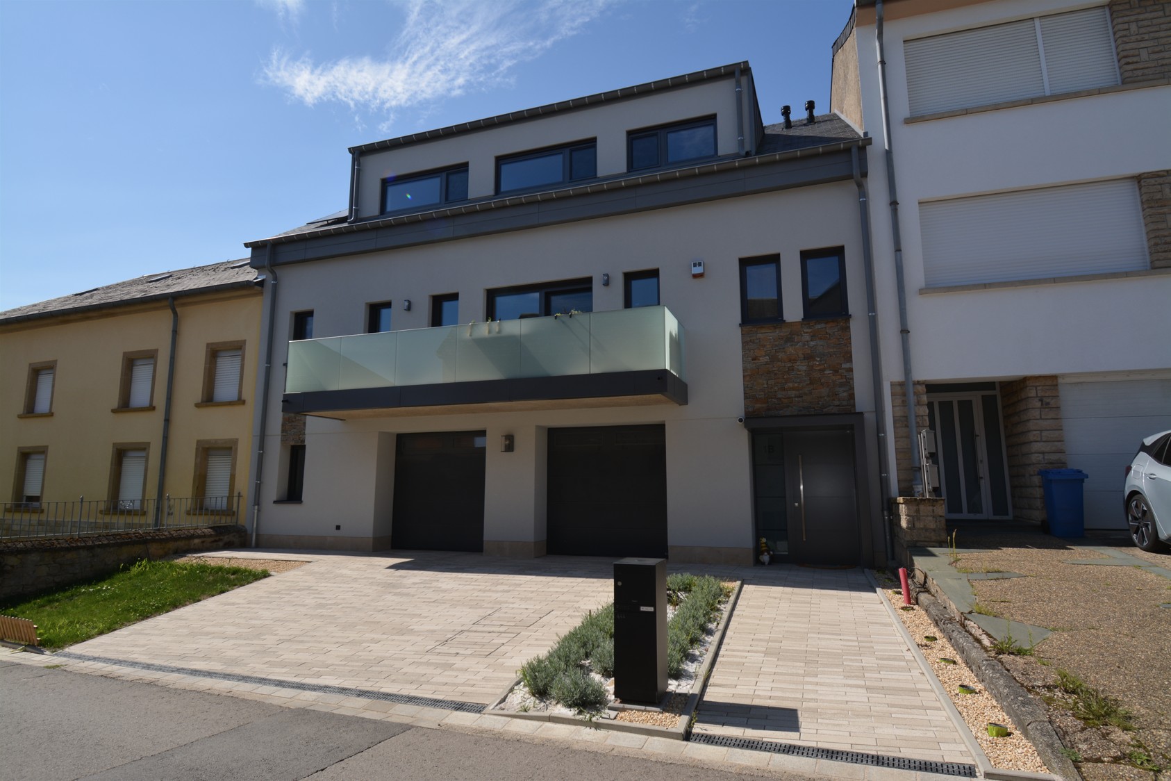 Aménagement paysager autour du bâtiment - XXA Architecture